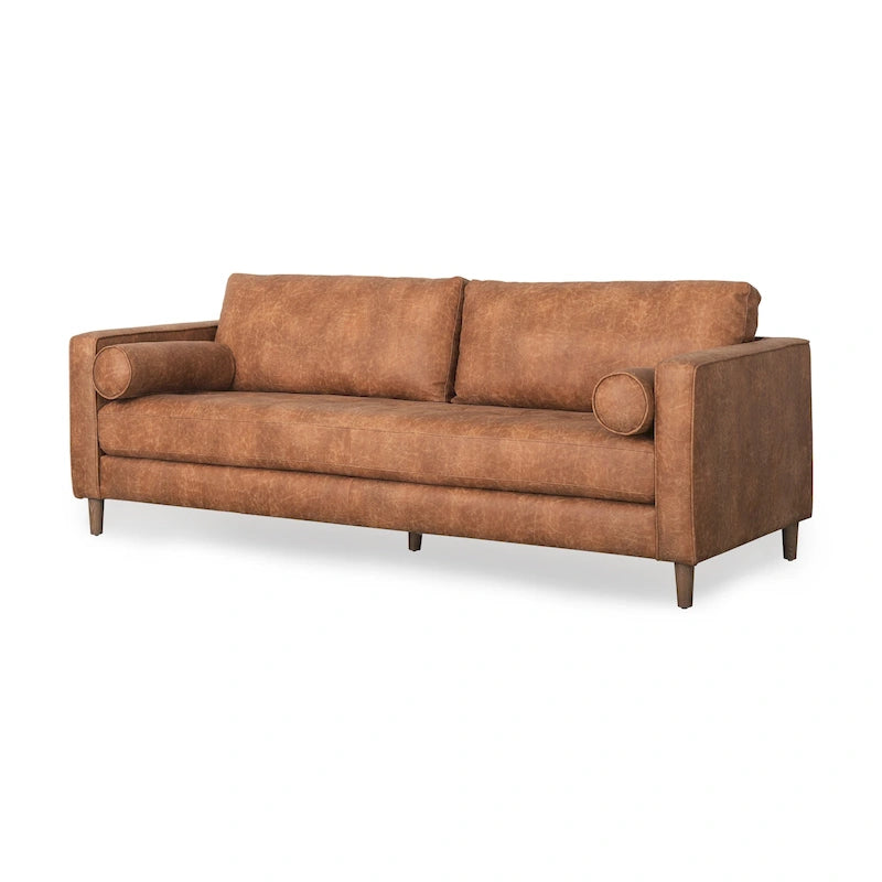 Canapé trois places en similicuir marron cognac avec coussins traversins - 87,9 L x 36,2 P x 33,8 H
