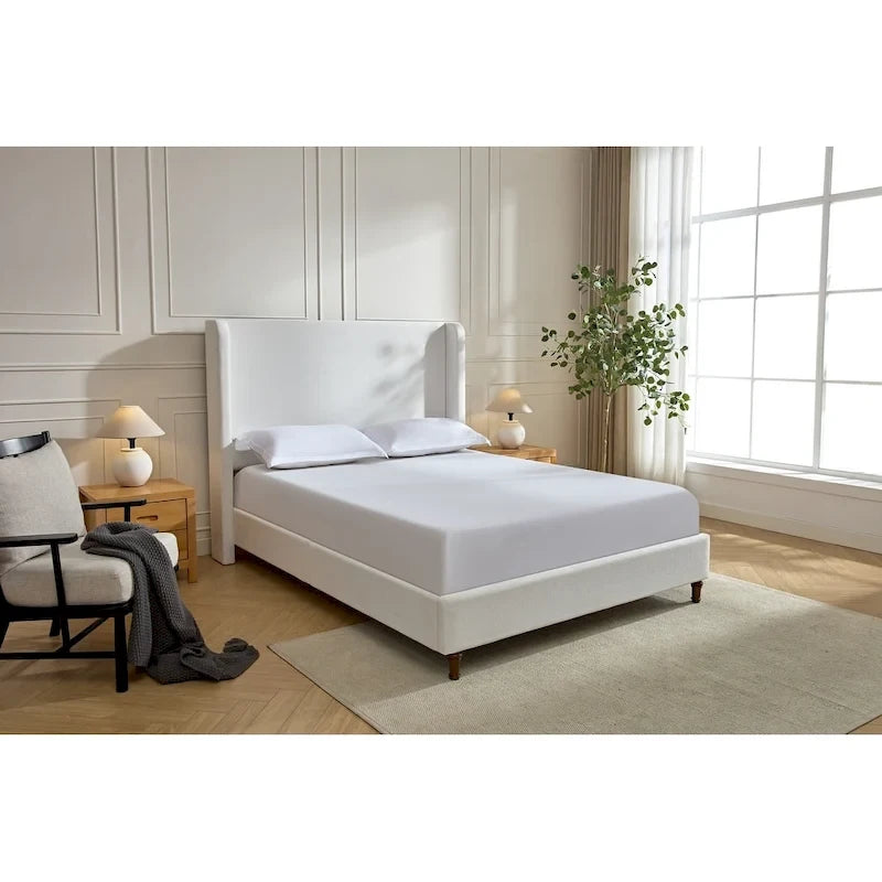 Lit capitonné à tête de lit haute, élégance et simplicité pour la chambre à coucher